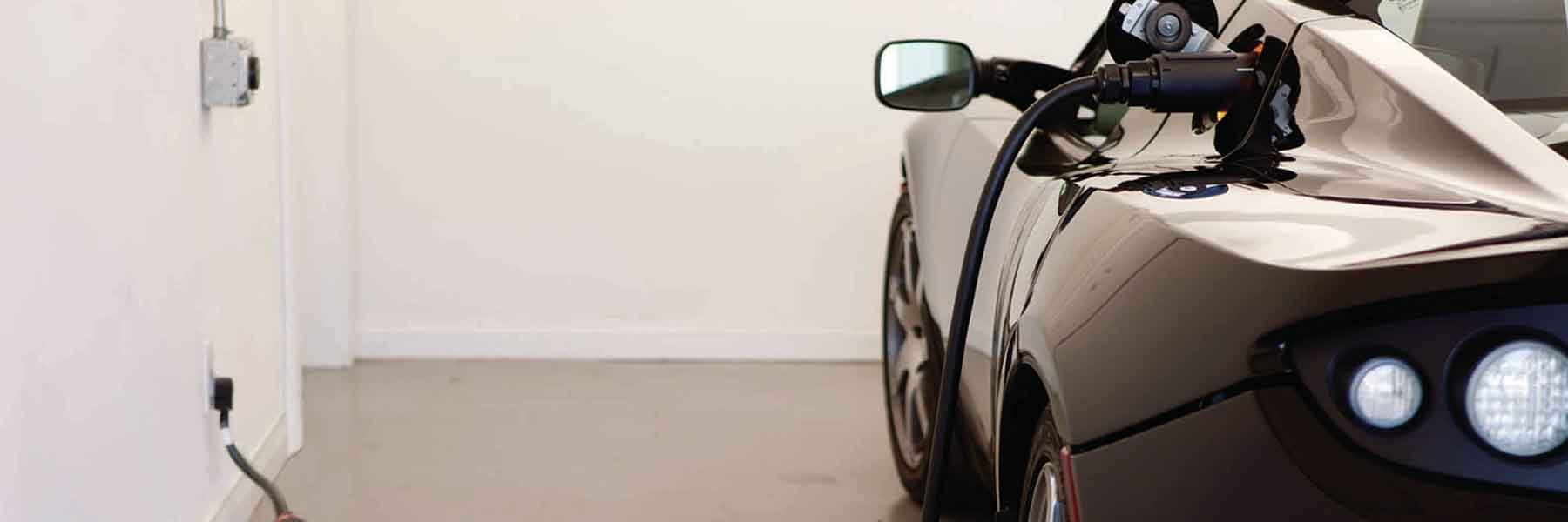 An electric car plugged in.